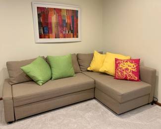 Sectional pull-out couch. Queen size sleeper. Like new.