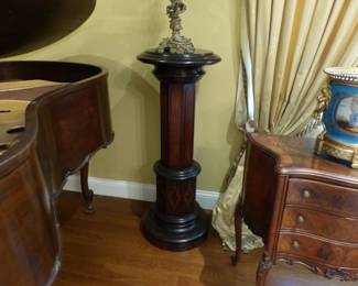 Wood pedestal, single bronze candelabra
