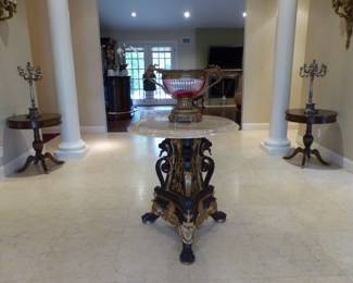 Stunning marble top entrance table, bronze chandelier, pair of bronze sconces, pair of small round tables, pair of candelabras