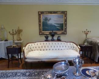 Tufted back sofa, pair of small side chests, pair of candelabras