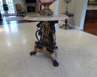 Stunning marble top entrance table, bronze chandelier, pair of bronze sconces, pair of small round tables, pair of candelabras