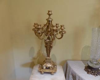 Pair of bronze candelabras, pair of marble pedestals
