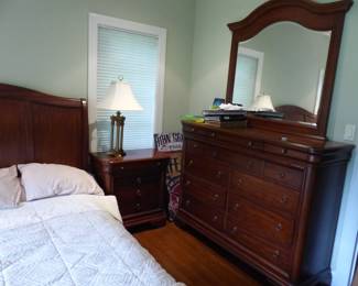 Bedroom set with bed, pair of night tables, dresser with mirror