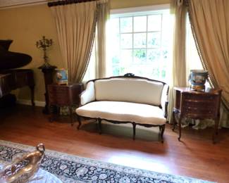 Mahogany frame neutral sofa, pair of side chests, pair of gorgeous jardinieres, custom draperies