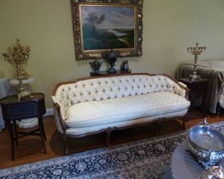 Tufted back sofa, pair of small side chests, pair of candelabras