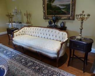 Tufted back sofa, pair of small side chests, pair of candelabras