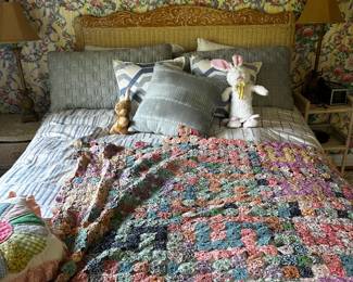 Carved wood and wicker bedroom furniture, vintage quilts, old dolls, pineapple brass lamps,