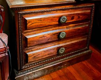 One of two matching oak side tables