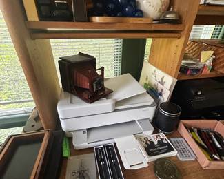 HP Printers, pine office desk with shelf, office supplies, telescope on stand,