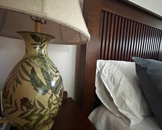 Deail of Stickley king size bed and Palm Beach Regency lamp