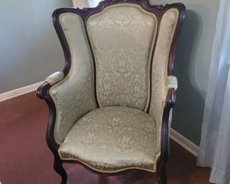 This Gorgeous Chair has been beautifully reupholstered to match the couch. This Chair is approximately 100 years old.