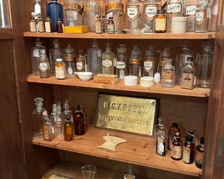 A closer look at the Apothecary bottles and advertising
