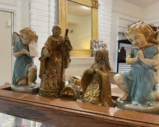 Nativity, and vintage guardian angels on top of the upright showcase