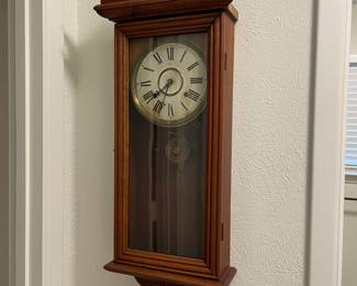 This is an antique William M. Gilbert clock, Winstead Conn. USA wall mounted clock