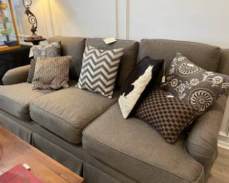 Sofa with great cushions, including hide