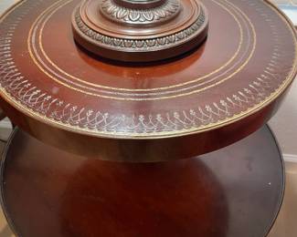 A close look at the top of the two tier table and the leather top