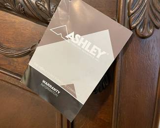 The Ashley label on the King Bed