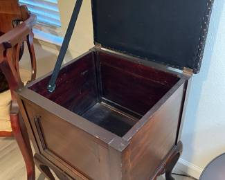 The inside of the blanket/storage chest