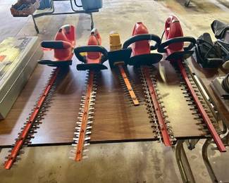 Variety of trimmers and yard tools