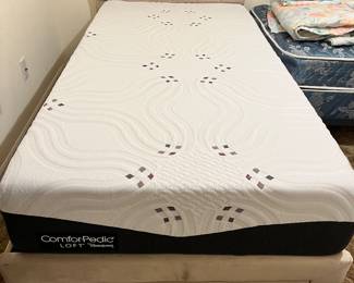 ComforPedic loft mattress on bed base with drawer