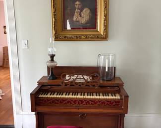 Antique artwork, pump organ and bench 