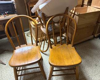 . . . two of a set of four antique chairs