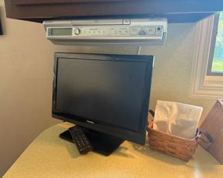 . . . small flat screen and under-cabinet radio
