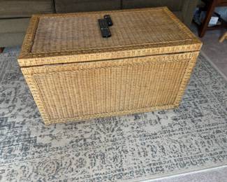 . . . wicker coffee table and area rug