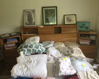 Queen headboard and 2 side cabinets. Also has a mattress base w/ storage