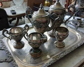 Silver plated copper Victorian tea set.