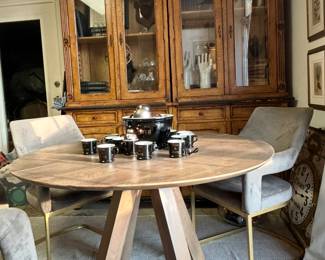 Large Custom Cabinets, Round Dining Table and Chairs.