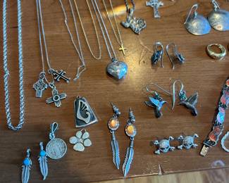 Lots more sterling silver including charms necklaces and bracelets… More close up pictures of these are tucked in the middle of the images for those of you who love the jewelry