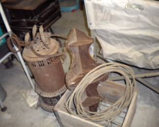 Antique ice tongs, milk crate, kerosene heater and other