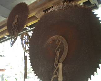 Large saw blade, well pulley and other