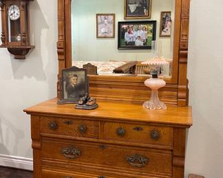 ANTIQUE CARVED OAK DRESSER WITH BEVELED MIRROR