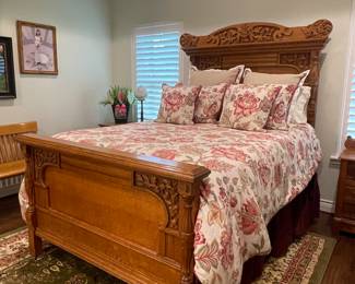 ANTIQUE VICTORIAN CARVED OAK FULL BED, QUEEN BEDDING AS A QUEEN MATTRESS WAS ADAPTED FOR THE ANTIQUE FULL SIZE BED