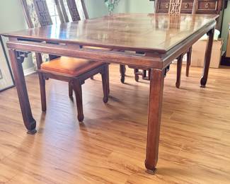 Century Furniture fretwork dining table.
Dimensions: 66”l x 44”w x 30”h (26”h under lip)
Comes with two 18” leaves. When both in the table is 102”l.