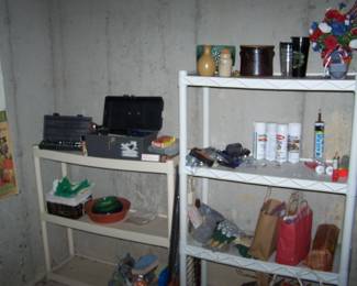 SHELVES OF MISC. IN THE BASEMENT