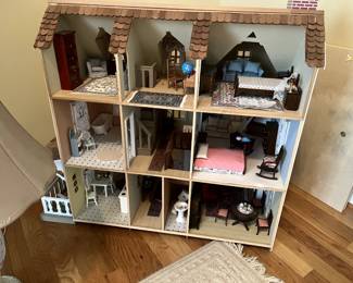 Victorian style dollhouse - fully furnished. Includes lazy susan rotating disk