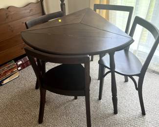 Unique triangular drop leaf table with four chairs