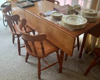 Drop leaf table with six chairs