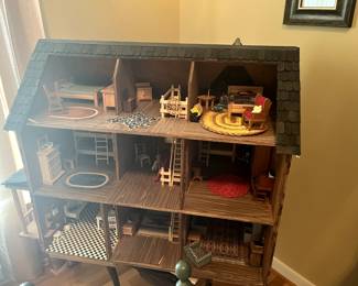 Log cabin doll house - fully furnished. Includes lazy susan rotating disk
