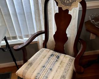 One of six cherry dining room chairs