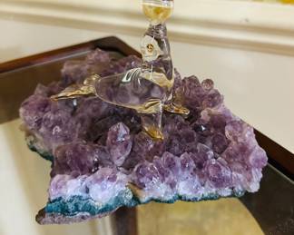 Sea lion glass figurine on quartz
