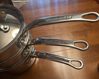 Large set of Kitchen Aid pots/pans