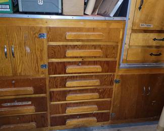 Lots of Garage Storage Cabinets for Crafts and Tools.