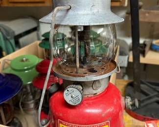 Vintage Kooklite red lantern. Coleman lanterns. Click on the link for more pics. https://modestlambestatesales.hibid.com/