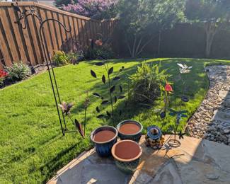 Flower pots, shepherds hooks, yard decor