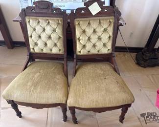 3208  2 Wooden Rolling Chairs 