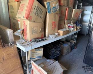 4002  Boxes of Clothes, Microwaves, Chairs, Misc Parts 